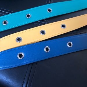 Coach yellow, blue, and green leather straps.